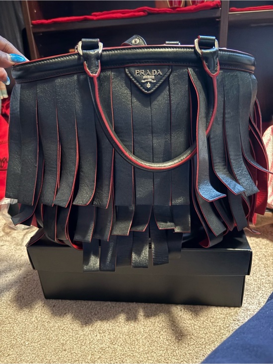 Prada Handbags - Prada Black Leather Fringe Tote with Red Trim Accent